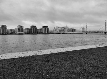 View of buildings against cloudy sky