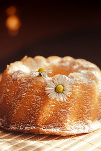 Cupcake decorated chamomile flower in the rustic style. authentic photo. easter concept greeting