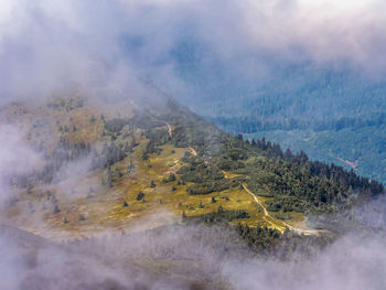 A view from babia mountain peak to mala babia mountain peak partially covered by clouds, poland