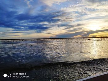 Scenic view of sea against sky during sunset