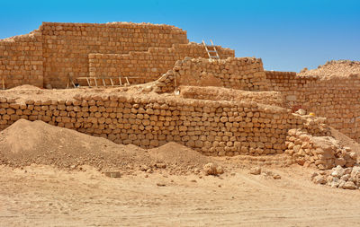 View of old ruin building against sky