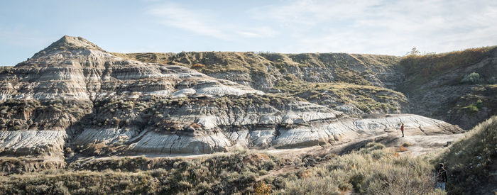 Rock formations on landscape against sky