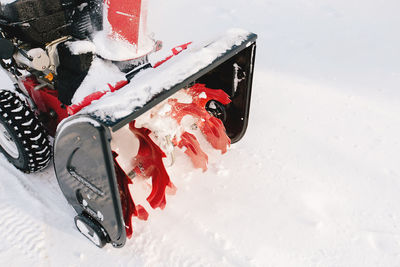 Close-up of snow covered bicycle