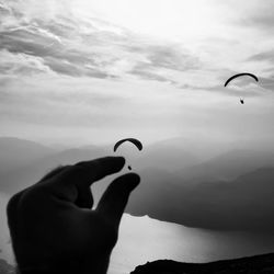 People paragliding in sky