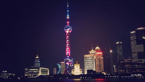 Illuminated cityscape at night