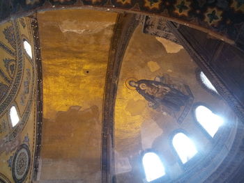 Low angle view of illuminated ceiling in building