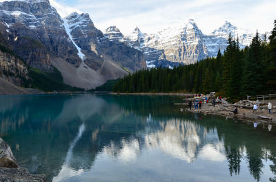 Scenic view of lake and mountains during winter