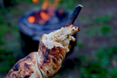 Close-up of stick bread. 