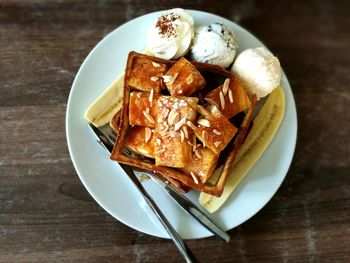 High angle view of dessert in plate on table