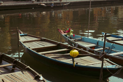 High angle view of boats moored in lake