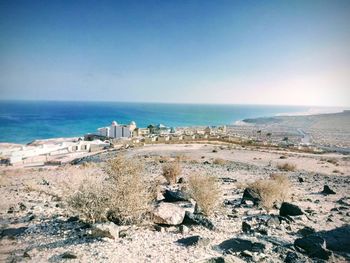 Scenic view of beach against clear sky