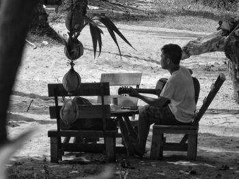 Man sitting on bench