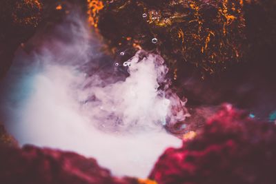 Close-up of smoke emitting from water