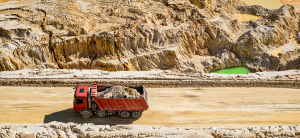 The red dump truck. kaolin quarry. vetovo village area, bulgaria.