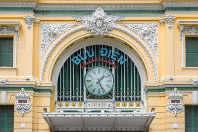 Low angle view of clock on building