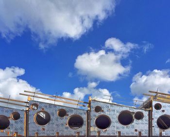Low angle view of built structure against blue sky