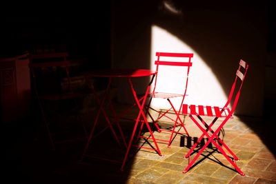 High angle view of empty chairs on table