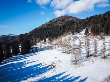 Scenic view of mountains against sky during winter