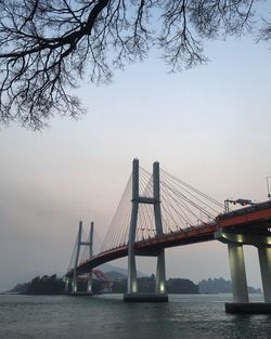 View of suspension bridge in city
