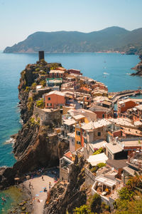 High angle view of town by sea