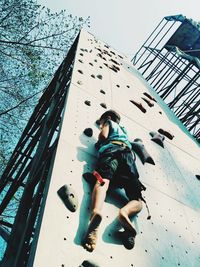 Low angle view of man against sky