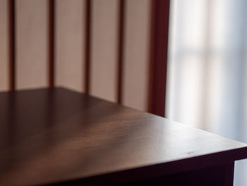 Close-up of curtain on table at home