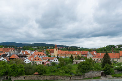 Buildings in city against sky