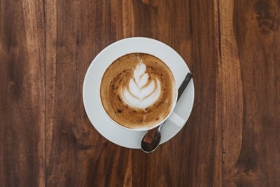 Directly above shot of cappuccino on table