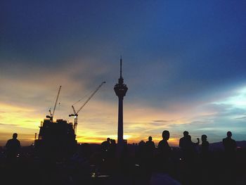 Silhouette of eiffel tower at sunset