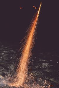 Illuminated fountain at night