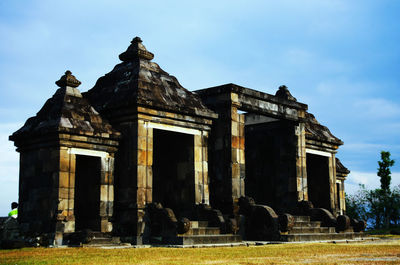 Low angle view of old ruin at ratu boko on sunny day
