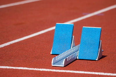 Close-up of starting block on running track