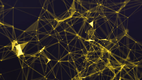 Full frame shot of illuminated connecting dots against black background