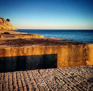 Scenic view of sea against clear sky