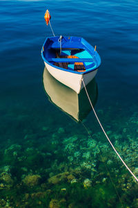 High angle view of boat moored in sea