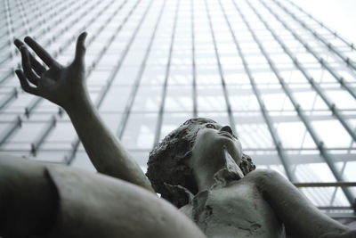 Low angle view of hand statue