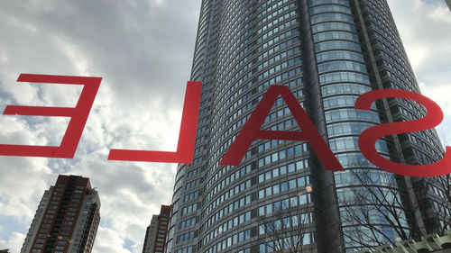 Low angle view of modern buildings against sky