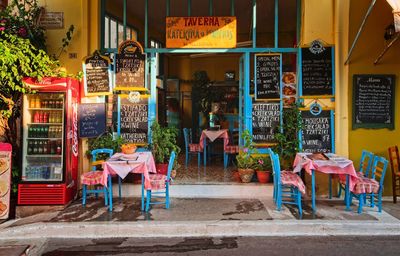 Chairs and tables in cafe at restaurant