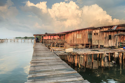 Pier over sea against sky