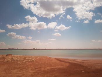 Scenic view of beach against sky