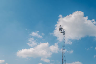 Low angle view of communications tower against sky