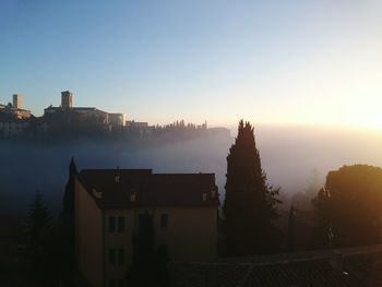 View of buildings at sunset