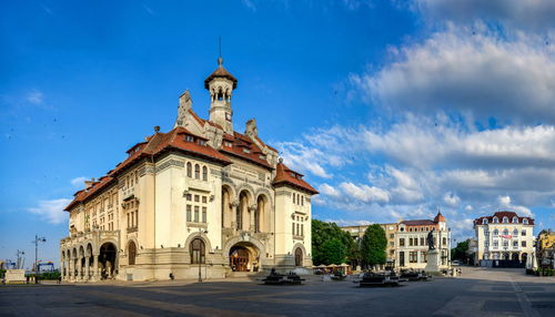 View of buildings in city against sky