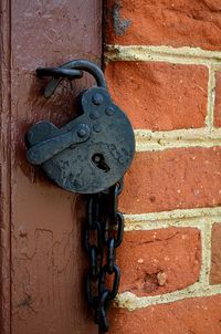 Close-up of padlock on door