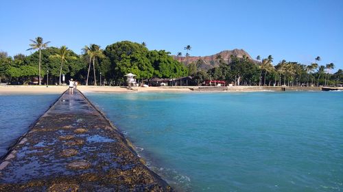 Scenic view of sea against clear sky