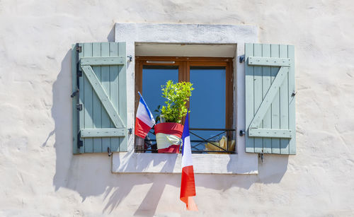 White building with national flag of france