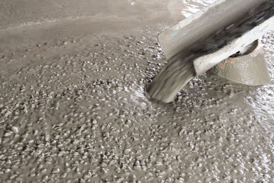 High angle view of wet sand