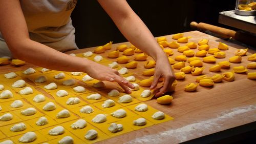 Midsection of person preparing food