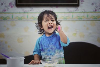 Portrait of smiling girl at home