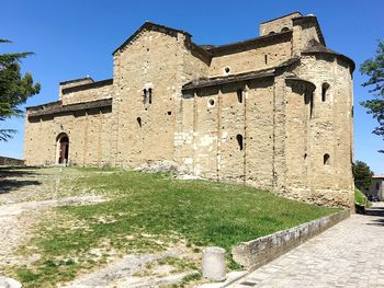 Low angle view of historic building against clear sky